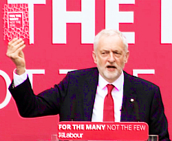 Pic: Corbyn holds up Labour manifesto - click to read worker's rights plan