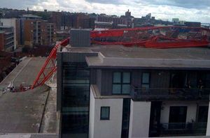 Crane collapsed onto apartment block - Pic from Liverpool Echo
