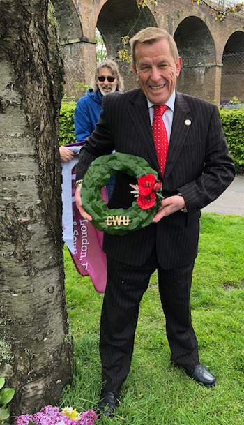 Dave Joyce lays a wreath from the CWU